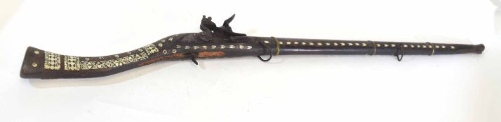 Middle Eastern or Persian flintlock camel gun with ivory inlay of geometric shapes, overall length