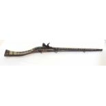 Middle Eastern or Persian flintlock camel gun with ivory inlay of geometric shapes, overall length