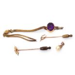 Mixed Lot: two 15ct stamped stick pins, a yellow metal and amethyst bracelet (broken) together