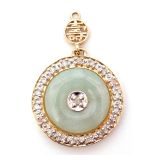 Modern jade and diamond set pendant, the circular shaped jade panel centering a small diamond in a