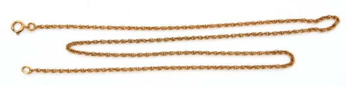 A 750 stamped chain, a fancy double oval link design, 23cm long, 3.4gms