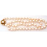 Modern cultured pearl necklace, a single row of uniform beads, 6mm diam, to a 375 stamped and