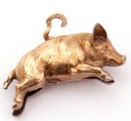 Small yellow metal pig pendant/charm, (a/f)