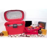 Pink Samsonite make-up/jewellery case and contents to include various costume jewellery, rings,