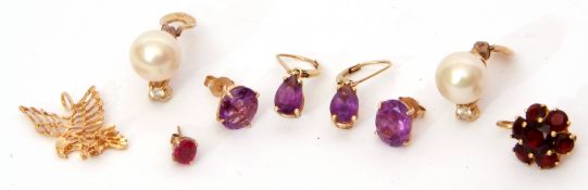 Mixed Lot: two pairs of 14K stamped amethyst earrings, a single garnet cluster earring in a 750