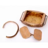 Mixed Lot: one 9ct gold cuff link, a 9ct gold wrist watch case, a broken 9ct gold earring, gross