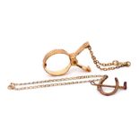 Mixed Lot: Victorian 9ct gold horseshoe and riding crop brooch, Birmingham 1892, a 9Kt stamped