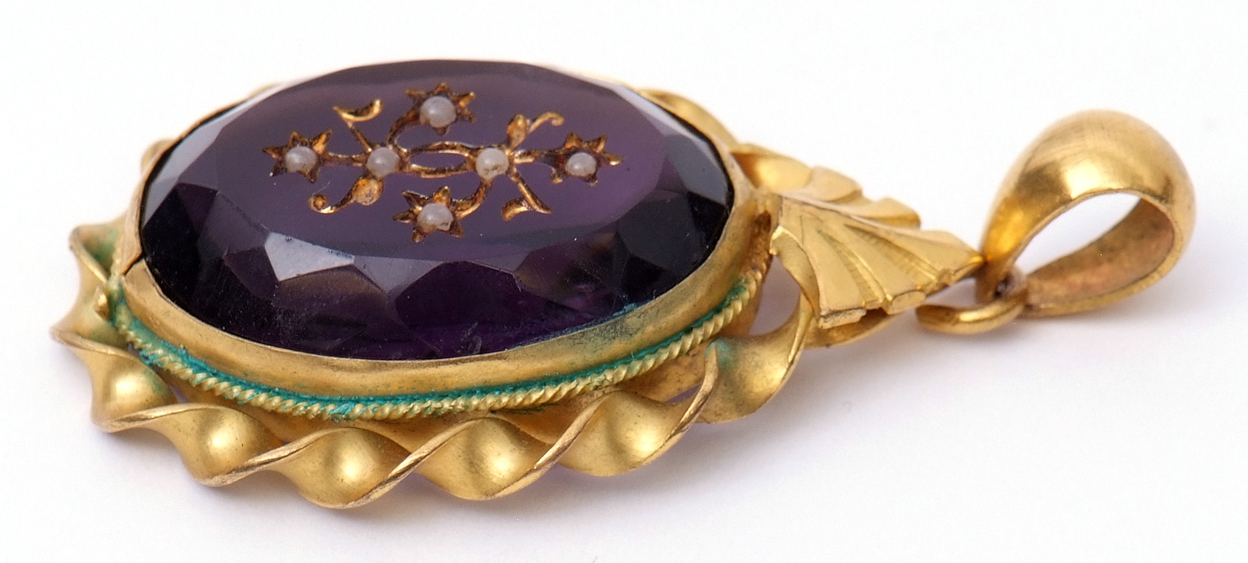 Victorian oval purple glass pendant, the faceted centre engraved and set with six small milk glass - Image 3 of 3