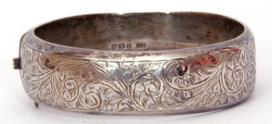 Hallmarked silver hinged bracelet, part foliate engraved, Birmingham 1951, gross weight 28.7gms