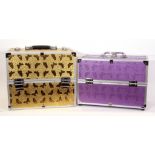 Two make-up/jewellery cases (void), both with butterfly decoration