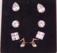 Four pairs of cubic zirconia stud earrings (one pair a/f)