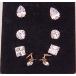 Four pairs of cubic zirconia stud earrings (one pair a/f)