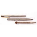 Two Parker fountain pens, one with 14K nib, together with a vintage metal pencil (3)