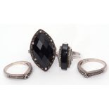 Mixed Lot: four 925 stamped rings, two with black onyx panels, highlighted with marcasite,