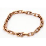 9ct gold bracelet featuring 23 oval links, each with textured and plain polished sides, 18cm long,