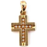 Mid-grade yellow metal cross, the engraved channel set with small pastes to a polished bale, 3 x 1.