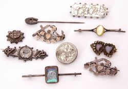 Mixed Lot: four hallmarked antique silver brooches, together with a metal butterfly wing brooch,