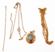 Mixed Lot: 9ct gold and hardstone pendant together with two 9ct stamped chains (broken), gross