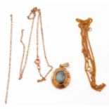 Mixed Lot: 9ct gold and hardstone pendant together with two 9ct stamped chains (broken), gross