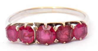 Precious metal five stone ruby ring featuring 5 graduated cushion cut rubies, finger size R (a/f)