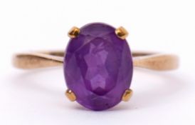 Amethyst dress ring, the oval faceted cut amethyst, 9 x 6mm, four claw set and raised between