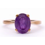 Amethyst dress ring, the oval faceted cut amethyst, 9 x 6mm, four claw set and raised between