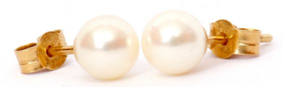 Pair of cultured pearl stud earrings in 750 stamped post mounts and fittings