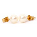 Pair of cultured pearl stud earrings in 750 stamped post mounts and fittings