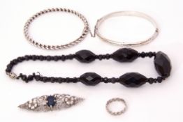 Mixed Lot: white metal hinged bracelet, a white metal rope twist bangle, a brooch and a Celtic ring,