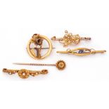 Mixed Lot: 15ct stamped openwork floral brooch, an 18ct stamped seed pearl set floral brooch, a 15ct