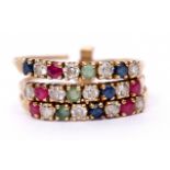 14K stamped stackable ring featuring three bands of small sapphires, rubies and paste stones, size