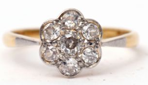 Diamond cluster ring featuring seven brilliant cut diamonds, the principal diamond 0.15ct approx,