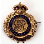 Royal Engineers badge, the centre with the George V crest within a blue enamel script, beneath a red