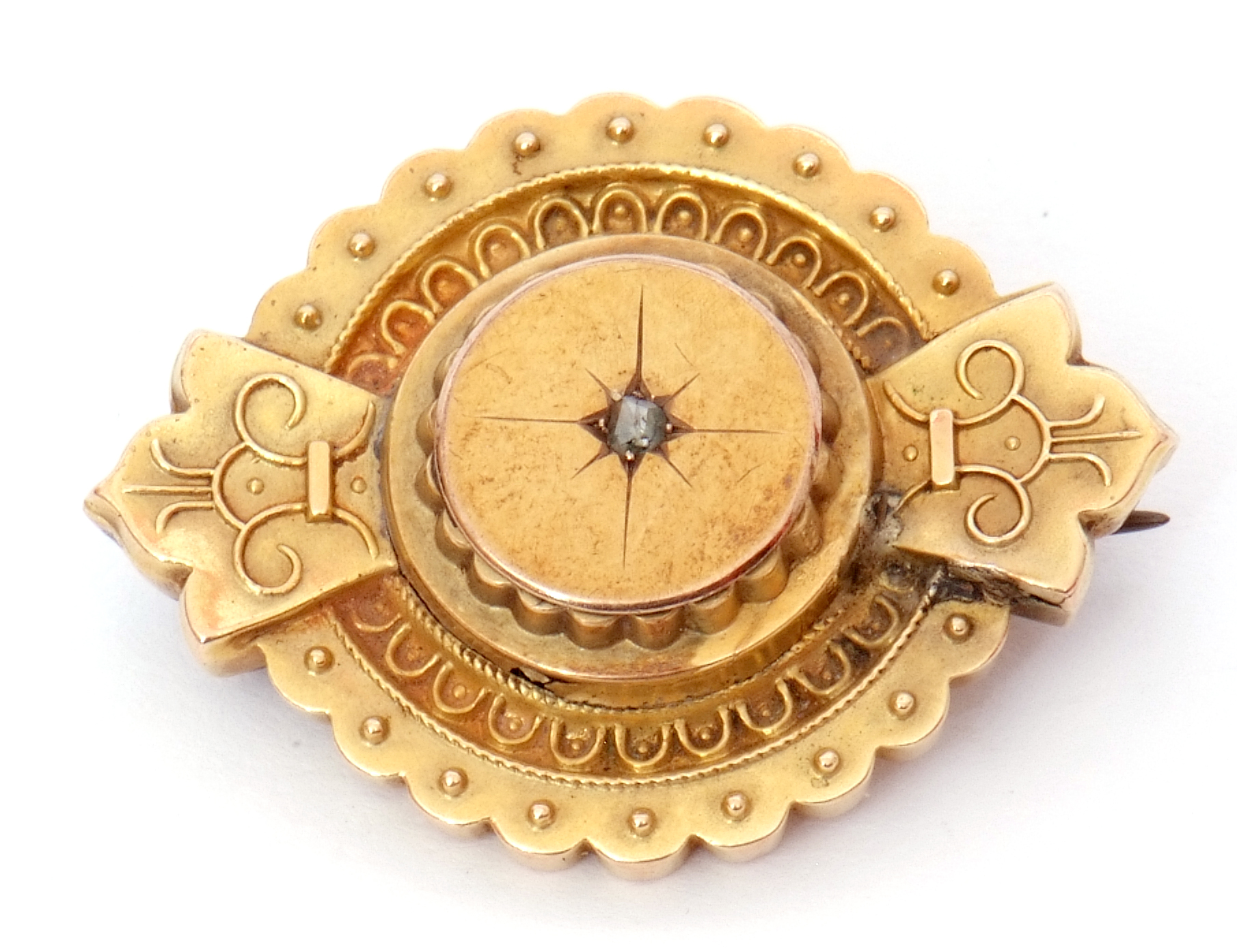 Victorian gold target brooch in Etruscan style, featuring a small central old cut diamond, glazed - Image 2 of 3