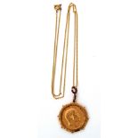 Edward VII sovereign dated 1910, framed in a 9ct stamped pendant mount, 9.5gms gross weight,