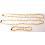 Mixed Lot: two cultured pearl necklaces, a single row of uniform beads, 6mm diam, together with a