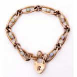 9ct gold curb link bracelet featuring 8 opal links, each centering an oval shaped bezel set opal