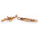 Mixed Lot: 9ct gold brooch, a design of a central wishbone on a foliate branch, together with a