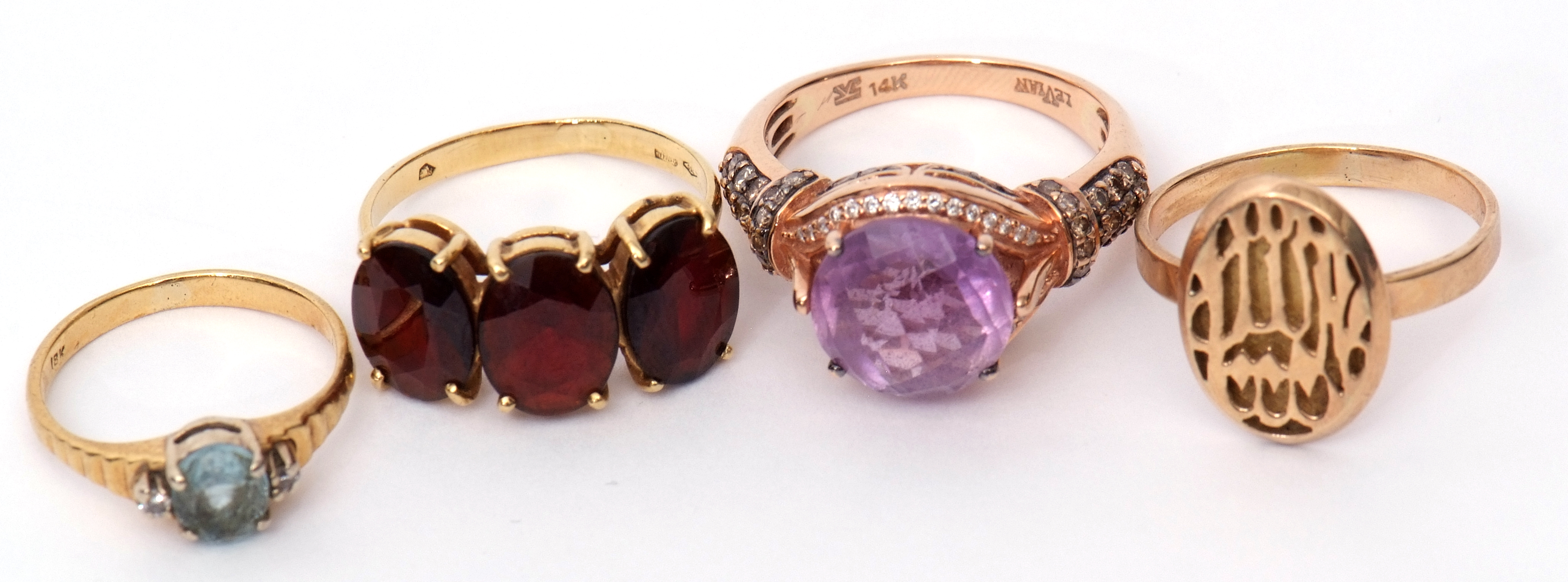 Mixed Lot: modern amethyst and diamond dress ring, stamped 14K, a modern 750 stamped three stone - Image 2 of 2