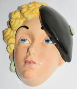 Beswick wall mask of a girl wearing black beret, Shape No 314, 22cm long