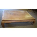 Very large hardwood coffee table, 104cm x 128cm