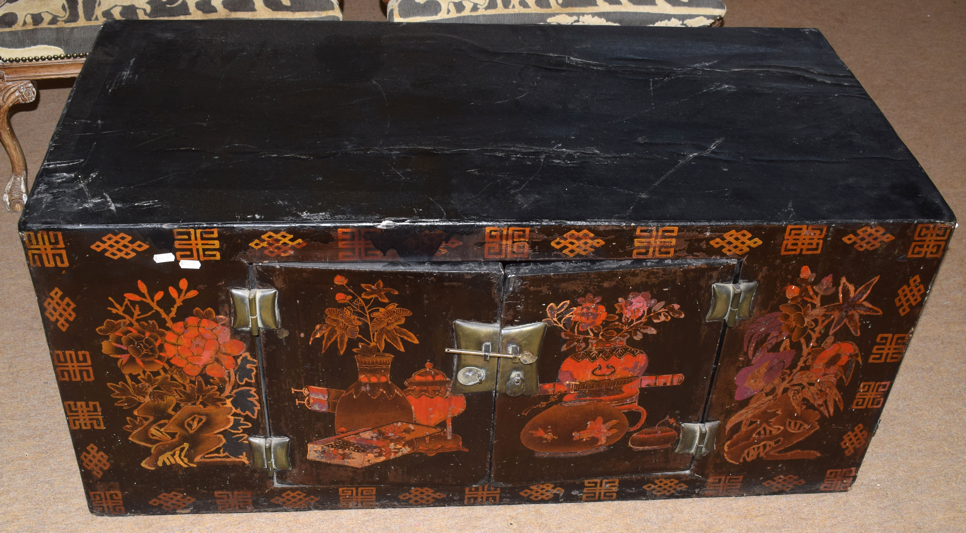 Modern Oriental cupboard in the form of a trunk with Chinese decoration to front panel and doors,