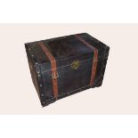 Modern designer wooden storage box, modelled as a trunk with leather straps, 77cm wide