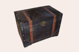 Modern designer wooden storage box, modelled as a trunk with leather straps, 77cm wide