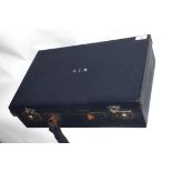 Art Deco travelling case with fitted interior, the top initialled L.I.R., contents include compacts,