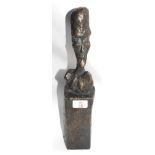 Bronze study of a head in the manner of Alberto Giacometti, the elongated head seated on a