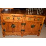 Modern Chinese style sideboard with four drawers over four doors, 145cm wide