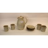 Yelland Pottery part coffee set comprising four coffee cans and saucers and a jug and cover, all