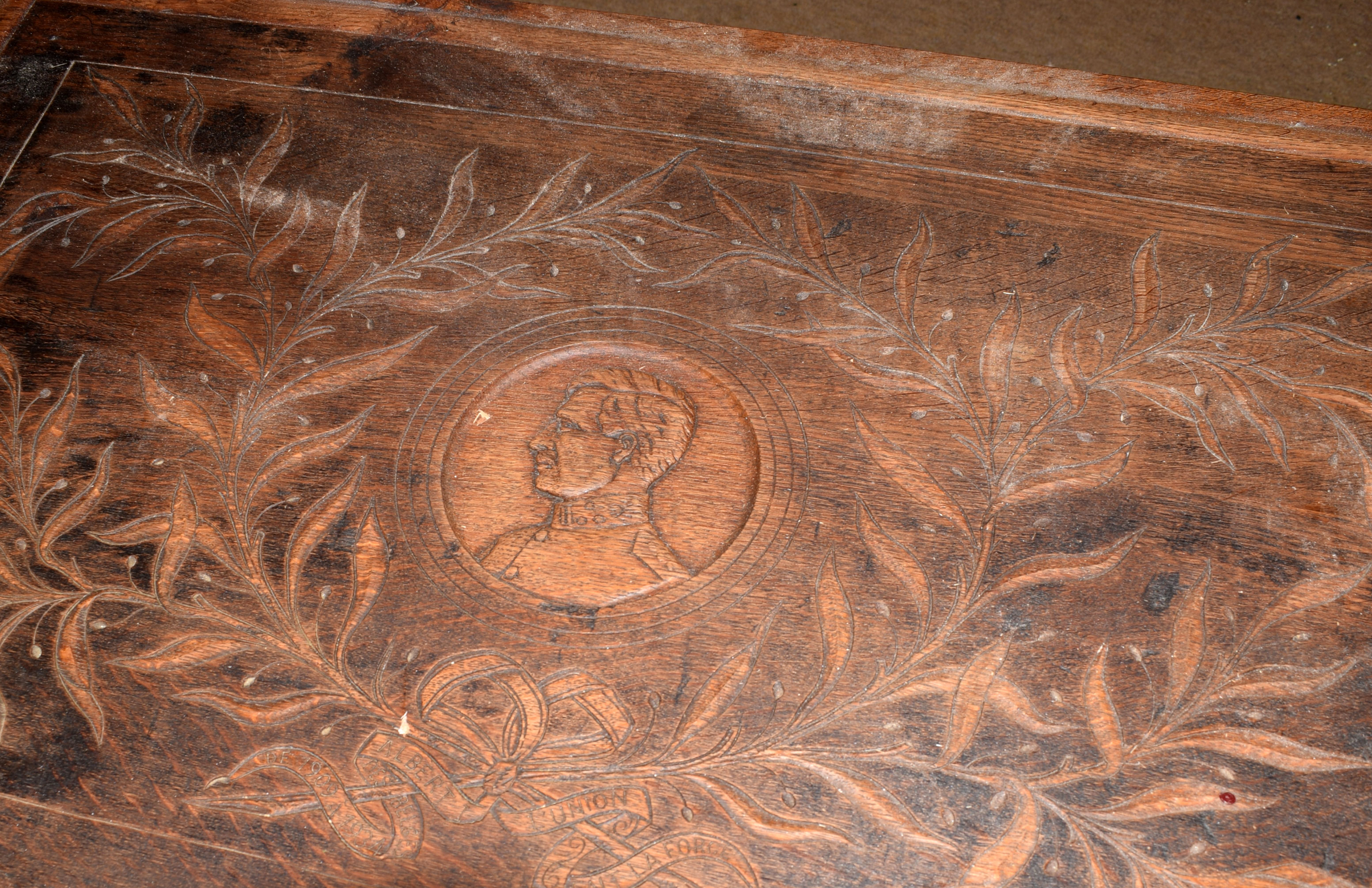 20th century coffee table with drawer, the top carved with leaves and portrait, inscribed "Albert - Image 2 of 2