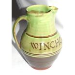 Winchcombe Pottery jug with green slip decoration dated Winchcombe 1950 by Ray Finch, impressed